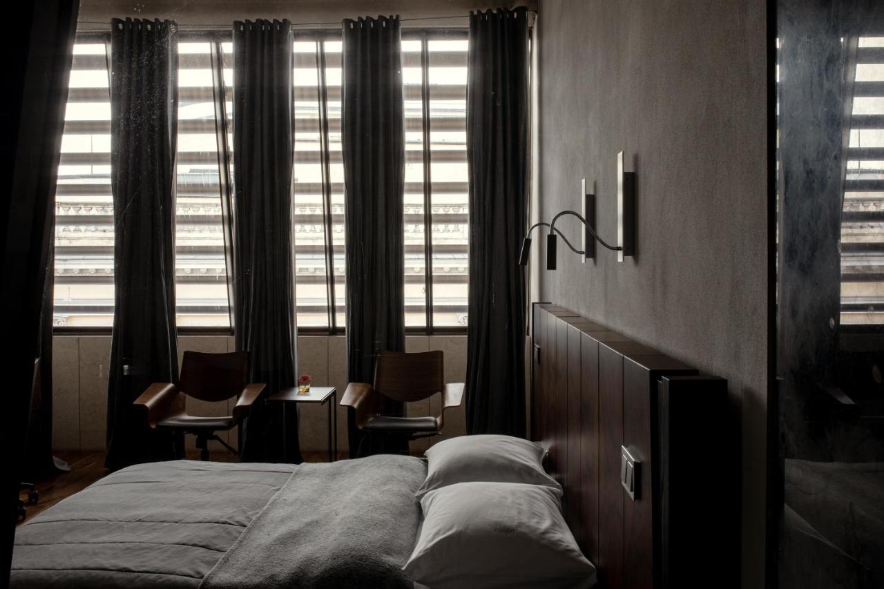 Hotel Monopol Wrocław Kültér fotó A room at the Hotel