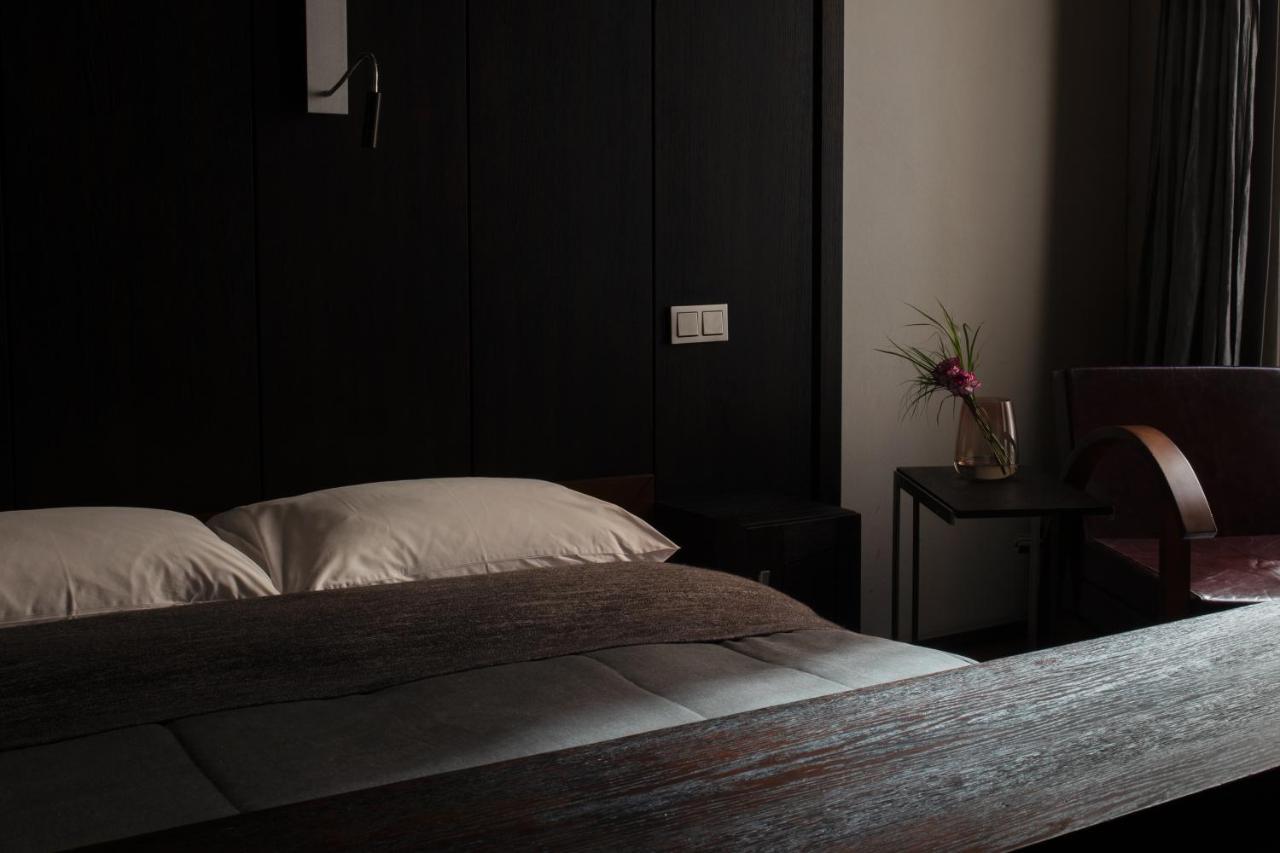 Hotel Monopol Wrocław Kültér fotó A bedroom