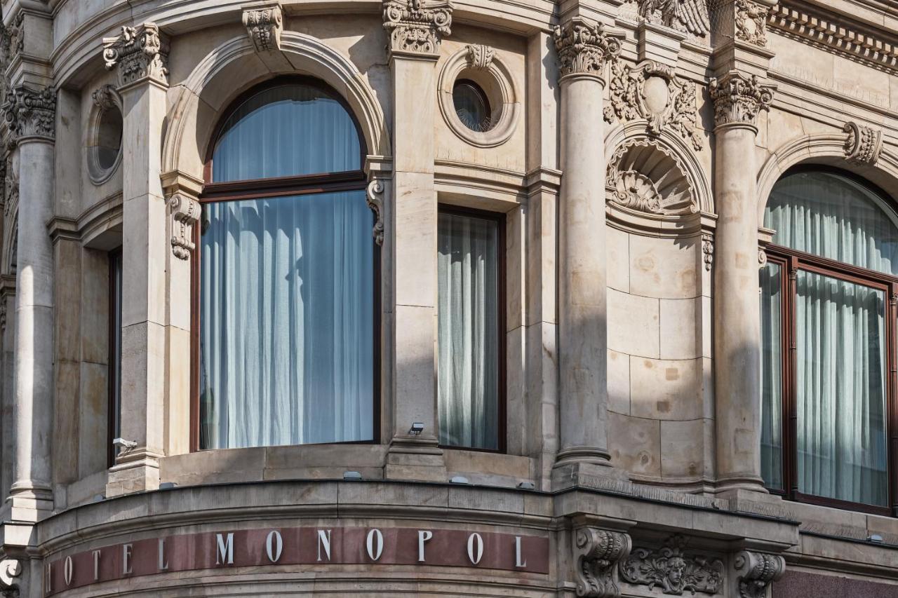 Hotel Monopol Wrocław Kültér fotó The hotel's name on the front of the building
